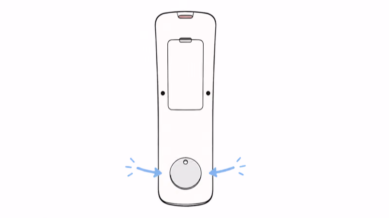 The back of a TV remote showing where to place an AirTag, low and away from the battery door and the infrared window