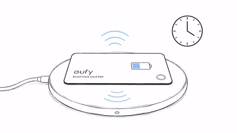 Slim eufy E40 card on a Qi wireless charging pad topping up its battery before the first pairing attempt