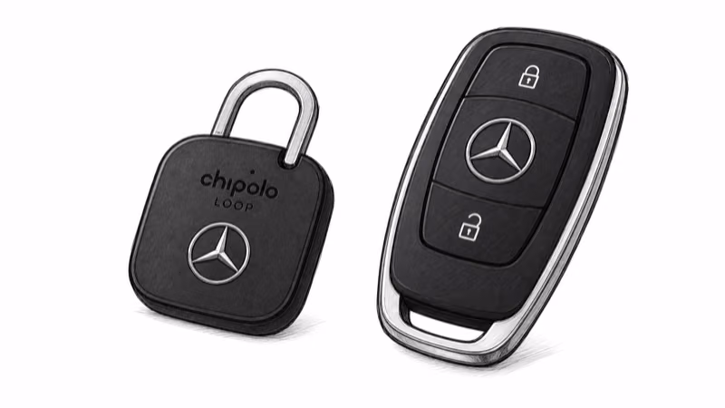 Black Mercedes-Benz Chipolo LOOP with a chrome star matched to a Mercedes car key fob