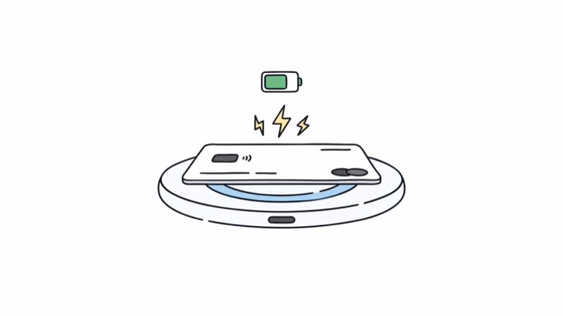 Nomad Tracking Card Air charging on a Qi wireless pad with battery indicator