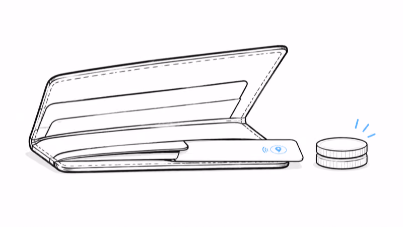 Ridge Tracker Card sliding into a slim wallet slot beside a two-coin stack